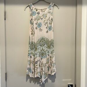 Free people intimates dress. Asymmetrical hem with tie back